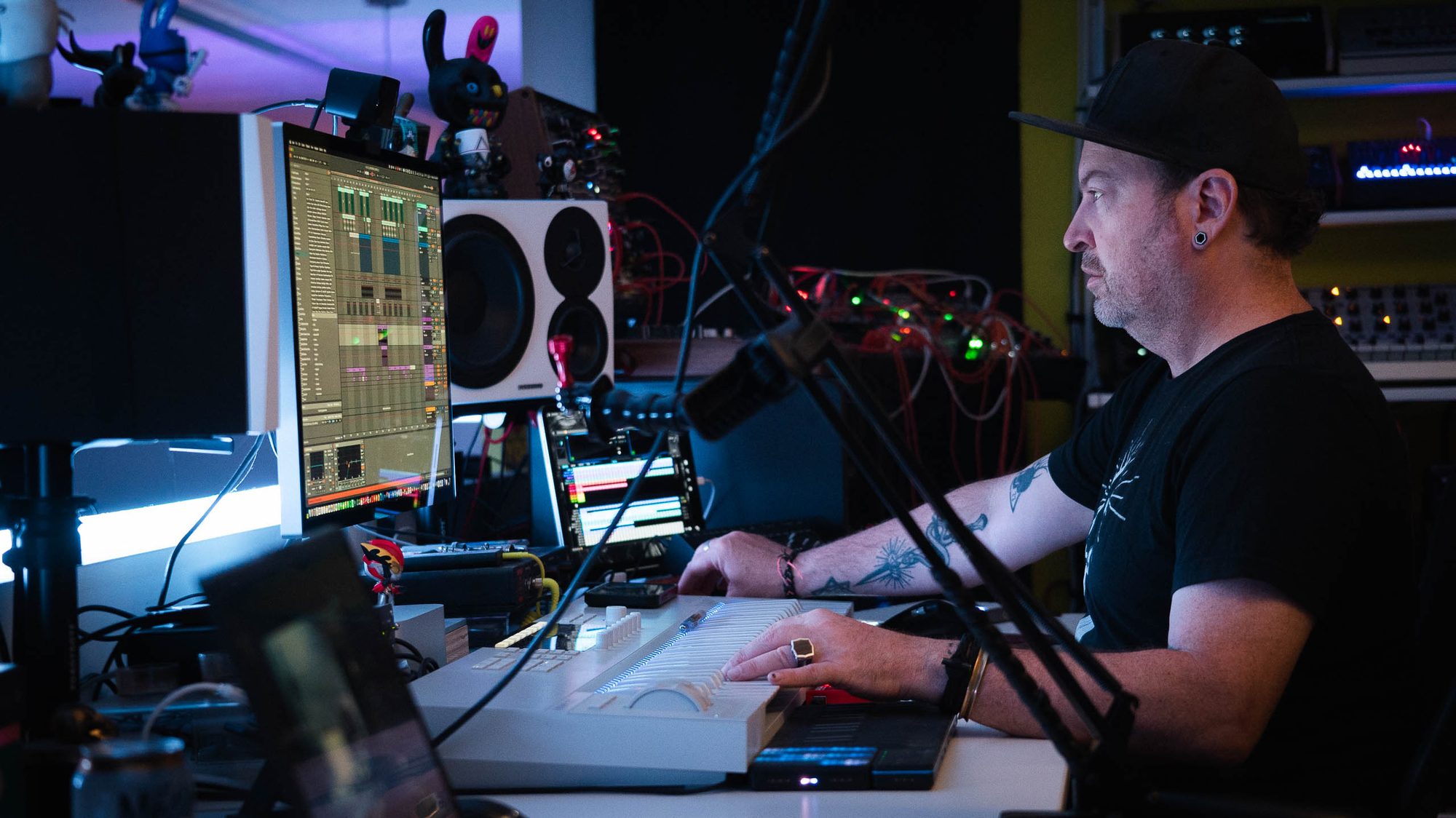 Mac Vaughn working at the studio desk